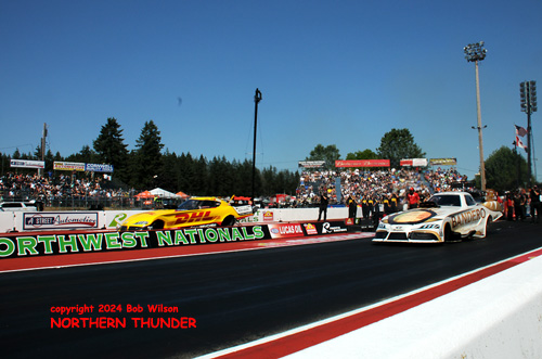 Alexis DeJoria (near lane) vs J.R. Todd (far lane)